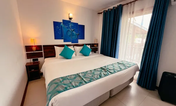 Unwind Dhigurah chambre moderne
